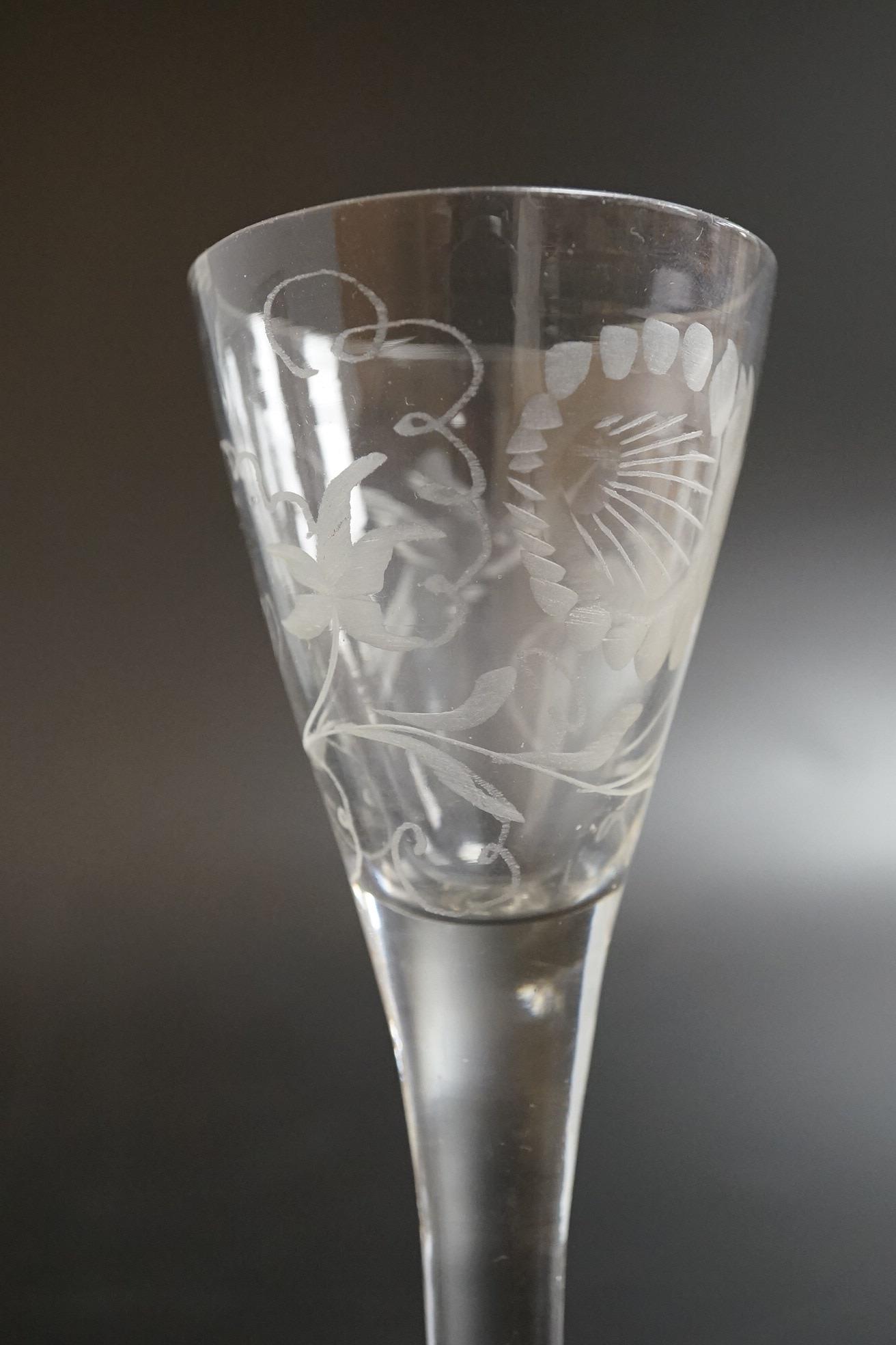 Two George III firing glasses, one with DSOT stem, together with a gin glass with engraved bowl, tallest 11.5cm high (3)